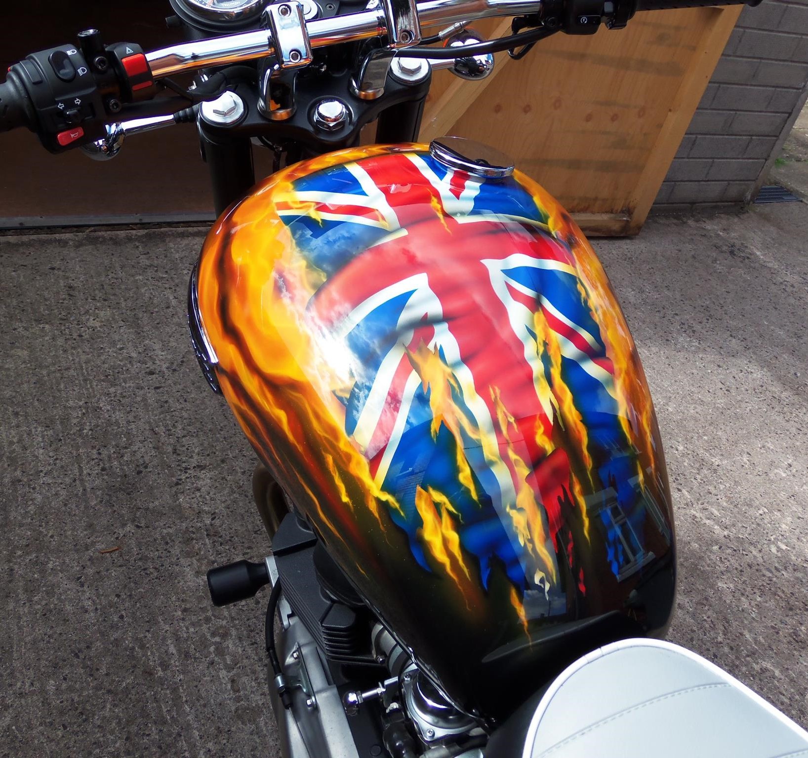 Airbrushed Painting of a Triumph Motorbike with Flame Design, Top View of Tank